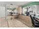 Inviting office featuring built-in desk and cabinets for storage, plus a view to the outside at 4714 Potomac Cir, Bradenton, FL 34210