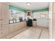 Bright office space with built-in cabinets and countertops, perfect for working from home at 4714 Potomac Cir, Bradenton, FL 34210