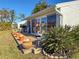 Outdoor patio seating area, perfect for enjoying the outdoor living at 4714 Potomac Cir, Bradenton, FL 34210