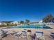 Enjoy this community pool with lounge seating for relaxing poolside at 4714 Potomac Cir, Bradenton, FL 34210