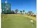 Enjoy the community Pitch & Putt Golf with well-manicured green and flags at 4714 Potomac Cir, Bradenton, FL 34210