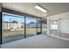 A screened patio gives way to the backyard with a fire pit and seating area at 5445 Bahia Vista St, Sarasota, FL 34232