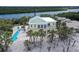 Beautiful waterfront home with balconies and a private backyard swimming pool at 777 N Manasota Key Rd, Englewood, FL 34223