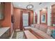 Inviting living room with patterned walls, a comfortable sectional sofa, and stylish decor at 8261 Grande Shores Dr, Sarasota, FL 34240