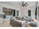 Cozy outdoor patio with comfortable seating, perfect for relaxing and enjoying the beautiful view at 8261 Grande Shores Dr, Sarasota, FL 34240