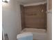 Bathroom featuring a tub and updated wall coverings at 1801 Gulf N Dr # 121, Bradenton Beach, FL 34217