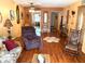 Comfortable living room with hardwood floors and eclectic furnishings at 515 30Th W Ave # H207, Bradenton, FL 34205