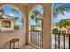 Relaxing balcony featuring a table and neighborhood views at 5972 Giardino Ln, Sarasota, FL 34232