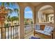 Charming balcony with seating area offering a relaxing outdoor space with views of the neighborhood at 5972 Giardino Ln, Sarasota, FL 34232