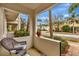 Inviting front porch with seating area and neighborhood views at 5972 Giardino Ln, Sarasota, FL 34232