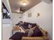 Cozy covered patio with comfortable seating, perfect for relaxing outdoors at 114 Gull Dr, Anna Maria, FL 34216