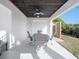 Outdoor patio seating area, perfect for enjoying outdoor dining and entertaining guests at 114 Gull Dr, Anna Maria, FL 34216