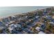 Coastal home boasts breathtaking ocean views and convenient beach access, nestled among lush tropical landscaping and neighborhood streets at 1214 Gulf Blvd, Englewood, FL 34223