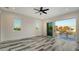 Bright bedroom with sliding doors leading to a balcony at 1214 Gulf Blvd, Englewood, FL 34223