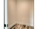 Walk-in closet with wood plank floors at 1214 Gulf Blvd, Englewood, FL 34223