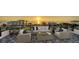 A rooftop deck featuring patio furniture with ocean views and a scenic sunset at 1214 Gulf Blvd, Englewood, FL 34223