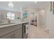 Open kitchen view featuring sink, countertop, and doorway leading to additional rooms at 14369 Eagle Branch Dr, Nokomis, FL 34275
