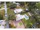 Aerial view showcasing the property, highlighting the pool, lush landscaping, and its desirable location at 2826 Marlette St, Sarasota, FL 34231