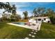Lush backyard with a private pool and mature trees at 2826 Marlette St, Sarasota, FL 34231