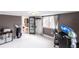 Bedroom with black french doors, modern decor, and great natural light at 2826 Marlette St, Sarasota, FL 34231