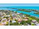 This property is located within a community close to the bay and is surrounded by mature trees and lush greenery at 424 Cezanne Dr, Osprey, FL 34229
