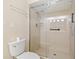 Modern bathroom featuring shower with glass door at 424 Cezanne Dr, Osprey, FL 34229