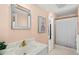 Bathroom with a vanity, framed mirror, and shower with curtain at 424 Cezanne Dr, Osprey, FL 34229