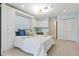 Bright bedroom features a pull-down bed, built-in desk area, white trim and plenty of storage at 424 Cezanne Dr, Osprey, FL 34229