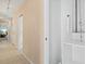 Hallway featuring ceramic tile flooring and neutral paint at 424 Cezanne Dr, Osprey, FL 34229