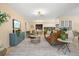 Bright living room with modern decor, neutral color palette, and stylish furniture creating a cozy and inviting atmosphere at 424 Cezanne Dr, Osprey, FL 34229
