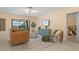 Comfortable living room with modern furniture and a view of the backyard at 424 Cezanne Dr, Osprey, FL 34229