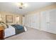 Main bedroom features spacious closet and carpet flooring at 424 Cezanne Dr, Osprey, FL 34229