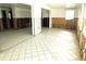 Expansive living room featuring tile floors, natural light, and potential for a modern design at 531 Edlee Ln, Longboat Key, FL 34228