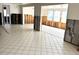 Expansive living room featuring tile floors, natural light, and potential for a modern design at 531 Edlee Ln, Longboat Key, FL 34228