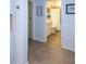 Hallway view of shared bathroom featuring a shower and bathtub combination with a vanity at 6614 162Nd E Pl, Parrish, FL 34219