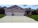 Charming home with a manicured lawn and a two-car garage at 6614 162Nd E Pl, Parrish, FL 34219