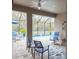Beautiful patio area with comfortable seating and a view of the pool at 6614 162Nd E Pl, Parrish, FL 34219