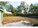 Large backyard with ample space for outdoor activities and gardening at 1010 E Lake Ave, Tampa, FL 33605