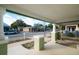 Inviting front porch with classic columns, a perfect spot to enjoy the neighborhood view at 1010 E Lake Ave, Tampa, FL 33605