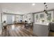 The open concept living room flows into a spacious kitchen and has lots of natural light at 1010 E Lake Ave, Tampa, FL 33605