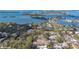 Aerial view of a building site surrounded by established homes near the water at 1401 Crocker St, Sarasota, FL 34231