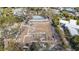 New home foundation surrounded by mature trees ready for building in a quiet neighborhood at 1401 Crocker St, Sarasota, FL 34231