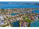 Expansive aerial view of a waterfront community with stunning bay views and lush landscaping at 3721 Flamingo Ave, Sarasota, FL 34242