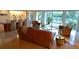 Bright living room featuring hardwood floors, modern furniture, and views of the outdoor scenery at 3721 Flamingo Ave, Sarasota, FL 34242