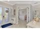 Inviting foyer features decorative glass front door and neutral colors, creating a welcoming atmosphere at 20686 Valprato Ct, Venice, FL 34293