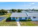 Charming single-story villa with neat landscaping and a concrete walkway leading to the front door at 3701 39Th W St, Bradenton, FL 34205