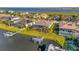 Aerial view of waterfront homes, showcasing its prime location with access to waterways and stunning views at 5607 Tidewater Preserve Blvd, Bradenton, FL 34208