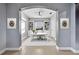 Bright home office with built-in bookshelves and a neutral color palette, perfect for productivity and focus at 5607 Tidewater Preserve Blvd, Bradenton, FL 34208