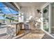 Outdoor kitchen featuring a stainless steel grill, sink, and plenty of counter space at 5607 Tidewater Preserve Blvd, Bradenton, FL 34208