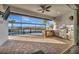 Outdoor patio with built-in grill, bar, and pool, perfect for entertaining and enjoying the view at 5607 Tidewater Preserve Blvd, Bradenton, FL 34208